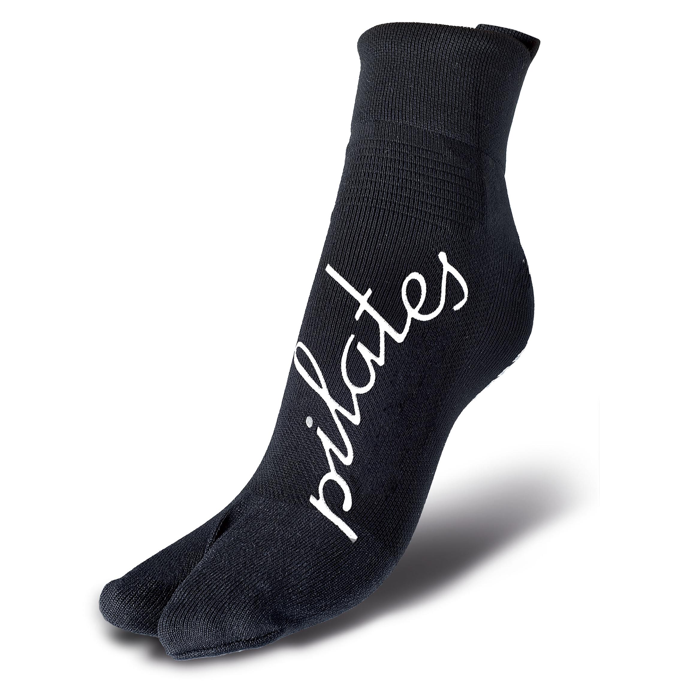 Person wearing pilates socks during a session