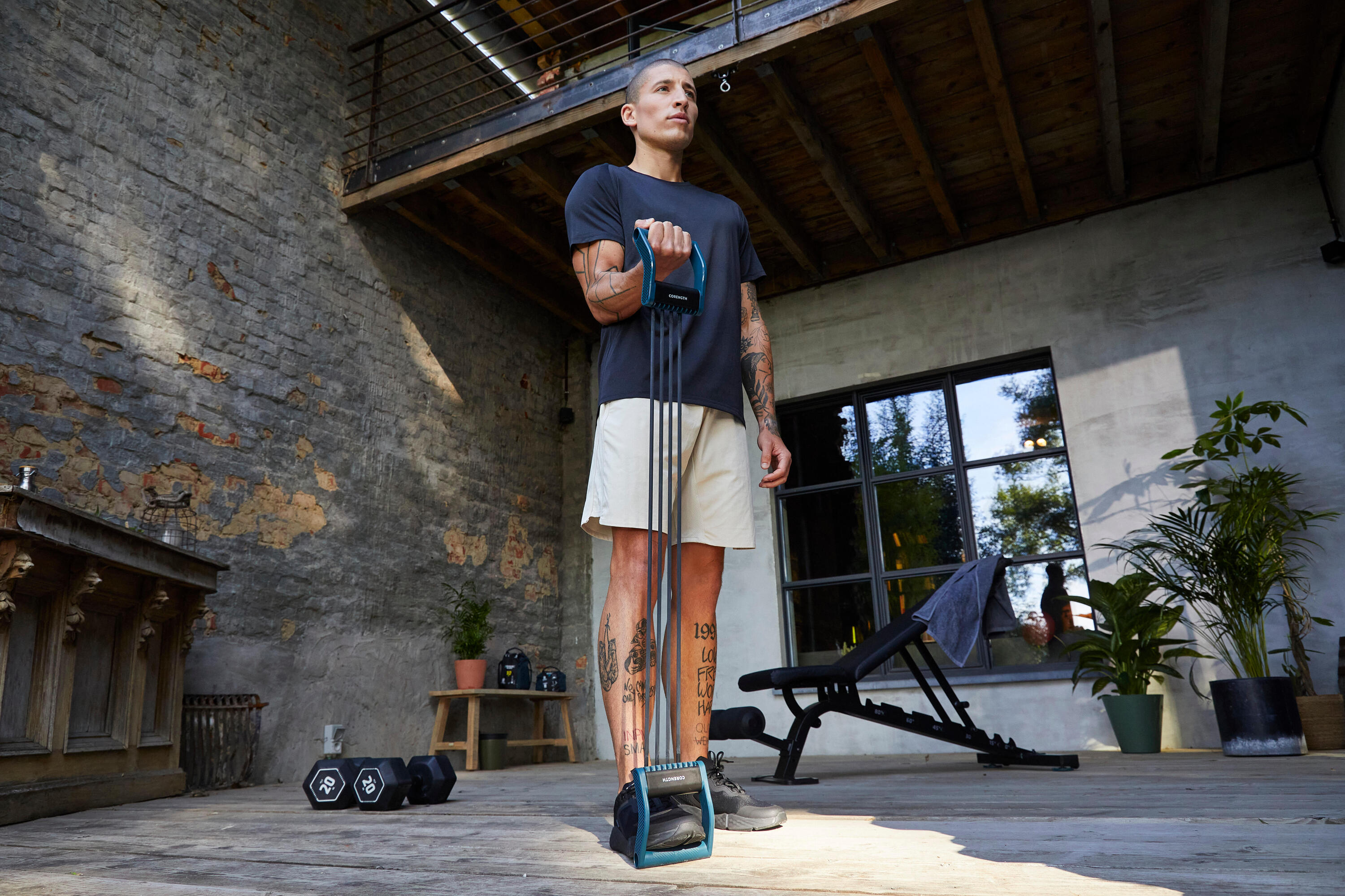 Man exercising with resistance bands