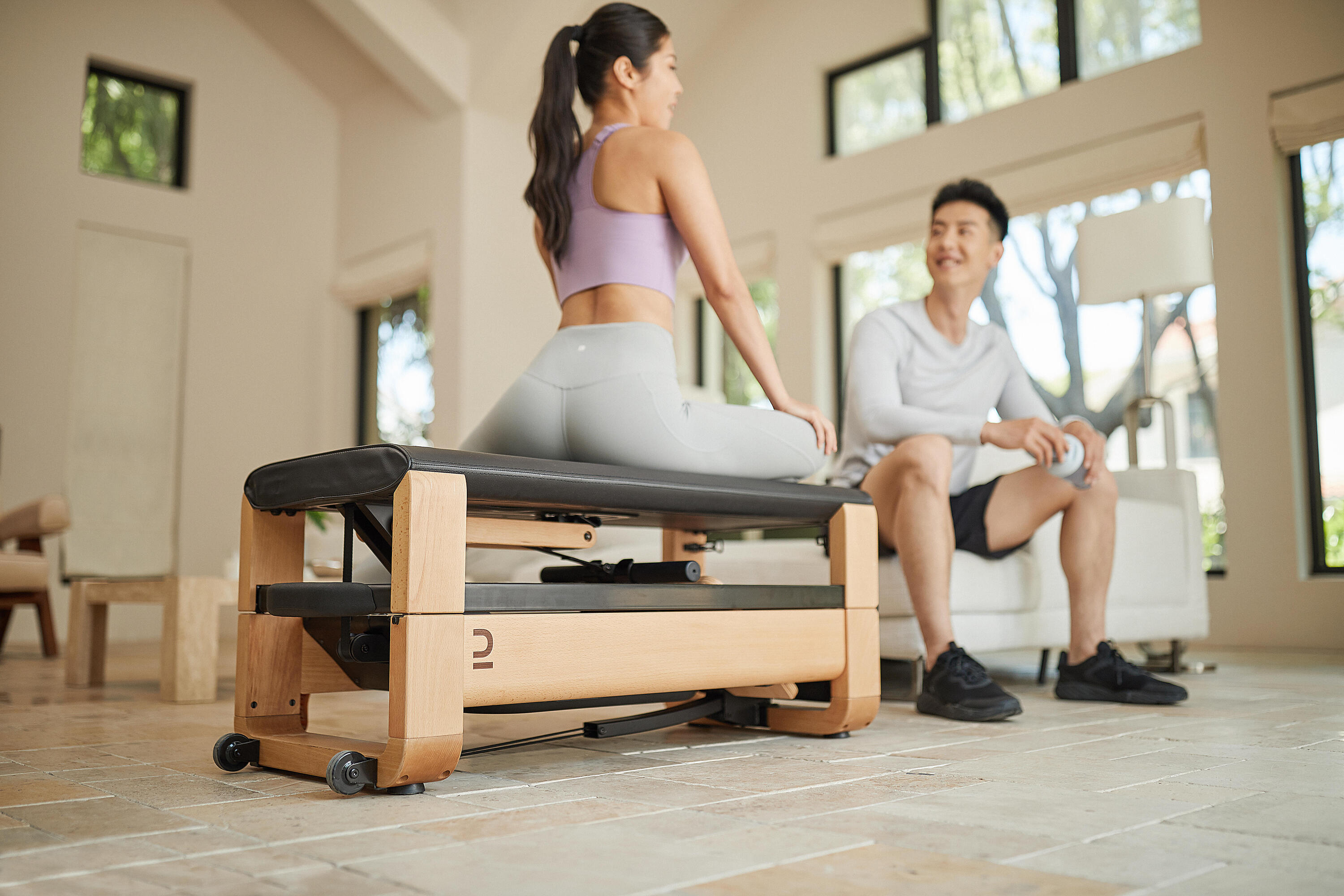 Woman exercising on a rowing machine