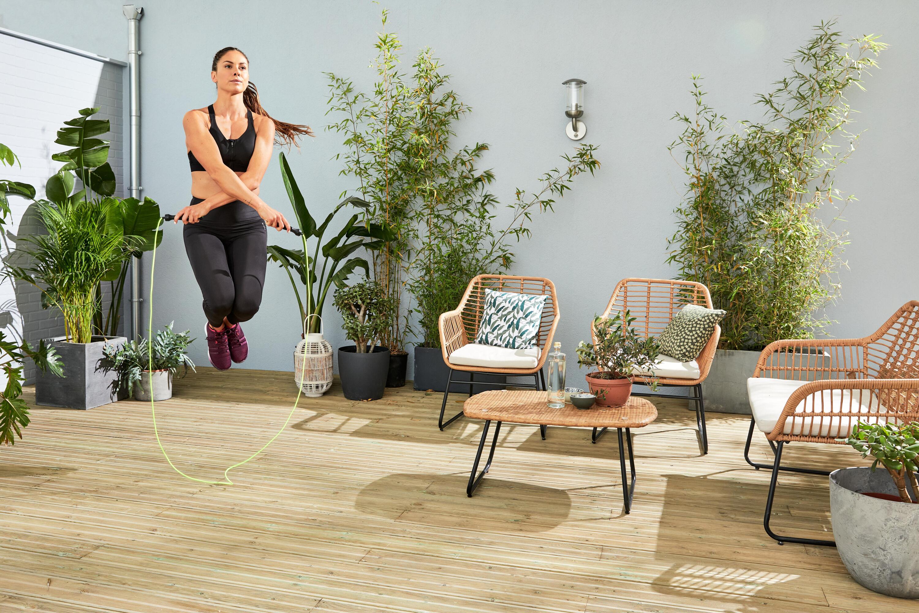 Person skipping with a jump rope outdoors