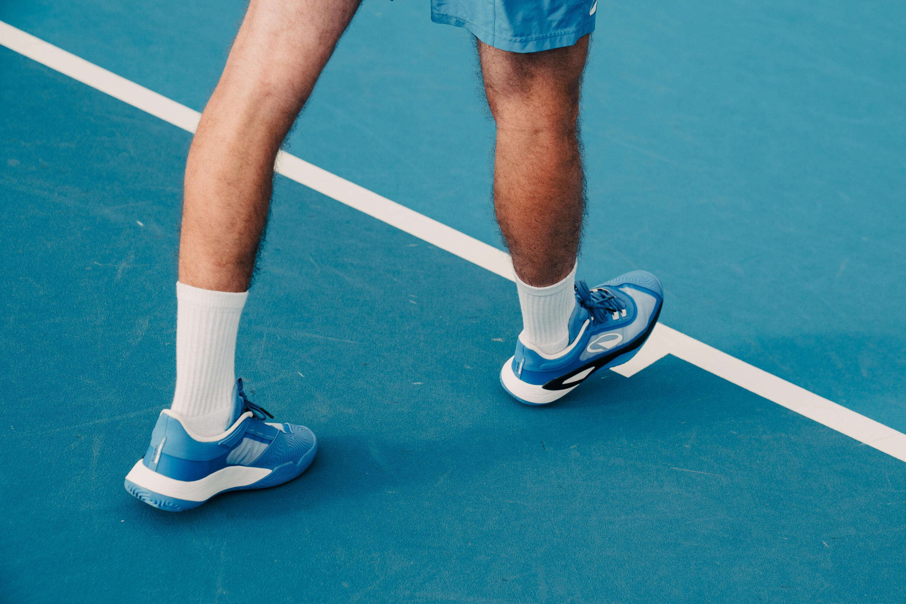 Close-up of tennis shoes during a match