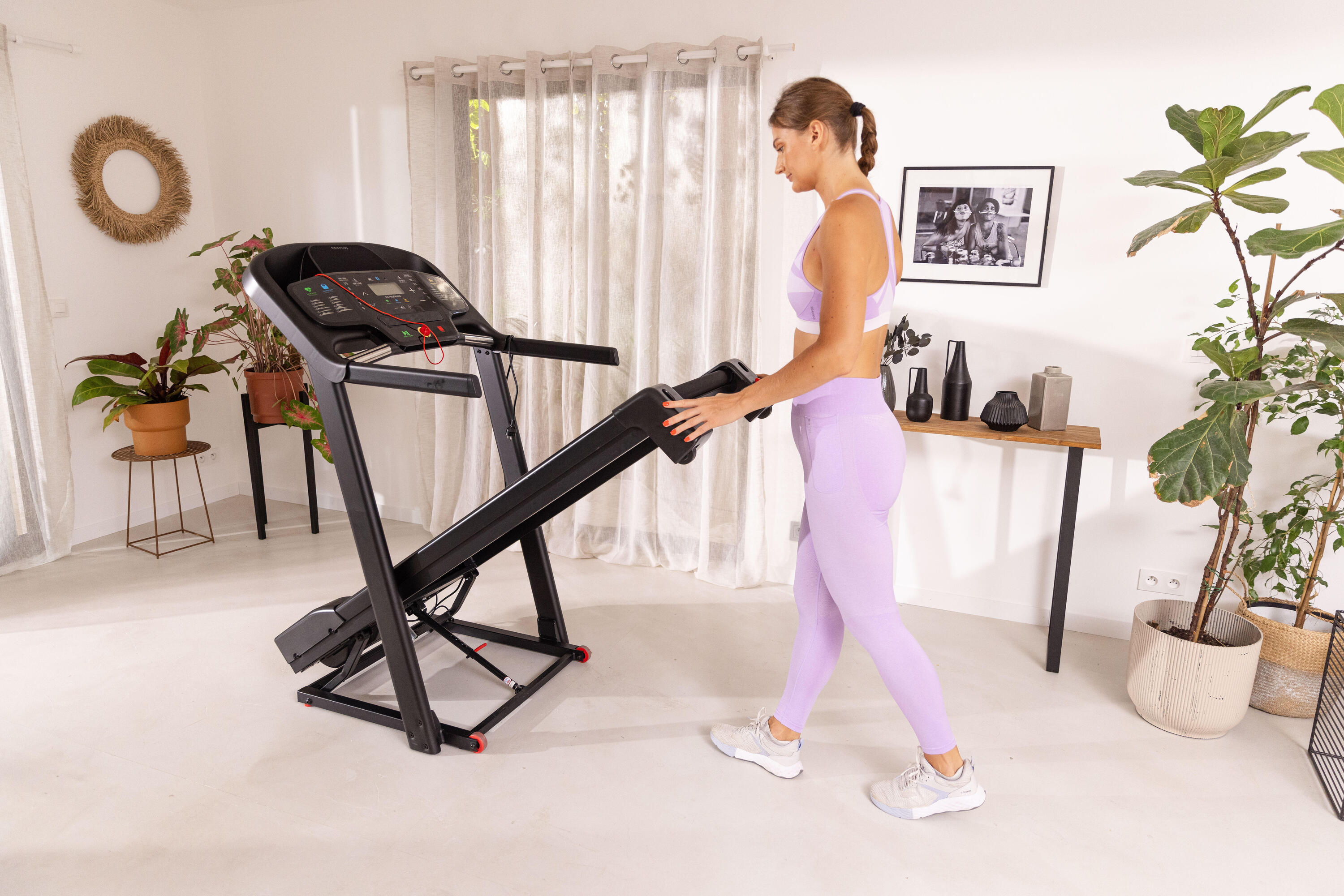 Foldable treadmill for compact spaces